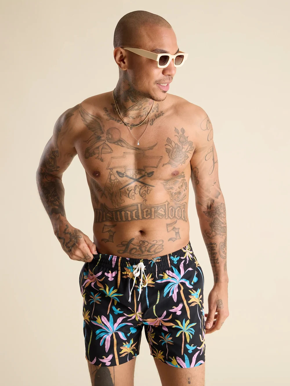 The Black Light Nights 5.5" (Classic Swim Trunk) - Image 1 - Chubbies Shorts