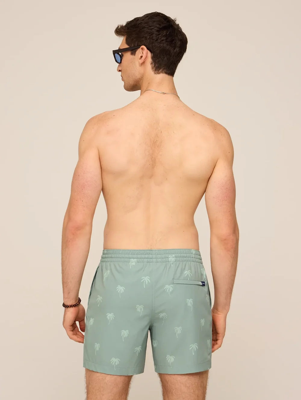 The Midnight Palms 5.5" Classic Lined Swim Trunk - Olive - Image 2 - Chubbies Shorts